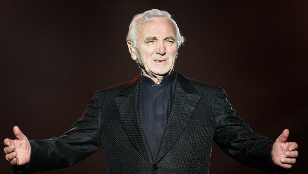 


French singer Charles Aznavour performs during the Quebec Summer Festival July 6, 2008.  - Reuters