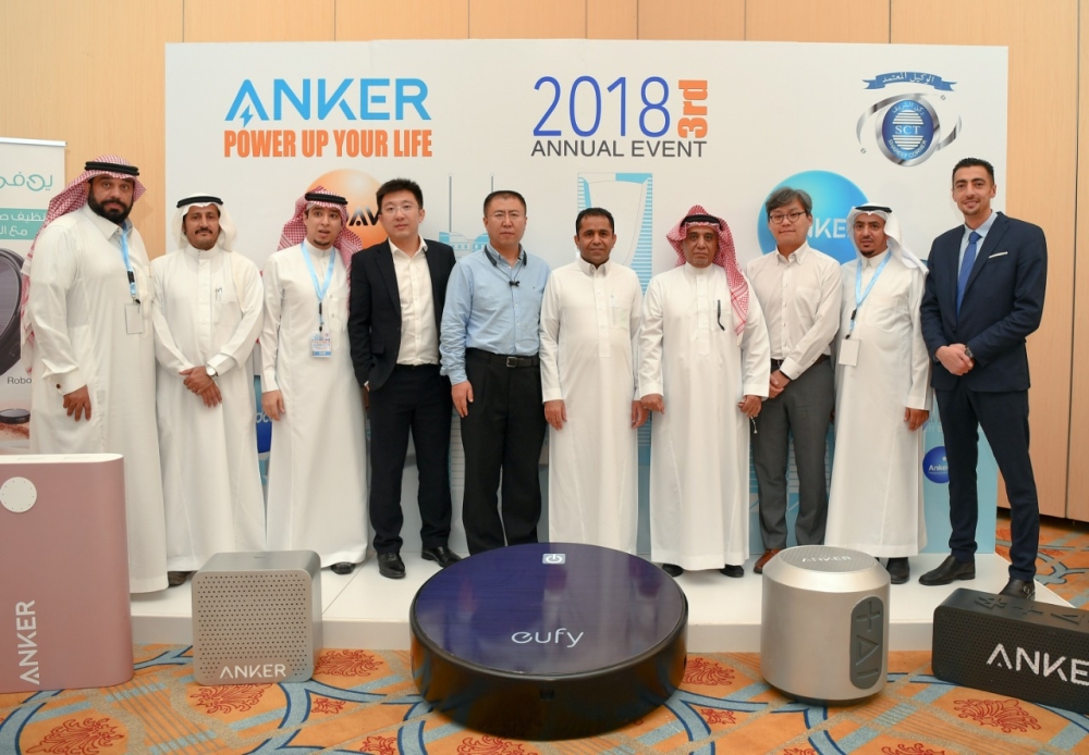 Group photo of Anker and Shareef Corner Trading Co. officials