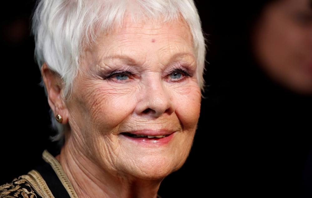 British actress Judi Dench smiles as she arrives at the 14th Zurich Film Festival in Zurich, Switzerland, on Wednesday. — Reuters