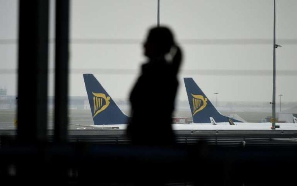 Europe's consumer affairs commissioner has called for closer scrutiny of budget airline Ryanair, whose planes are visible on the airport.