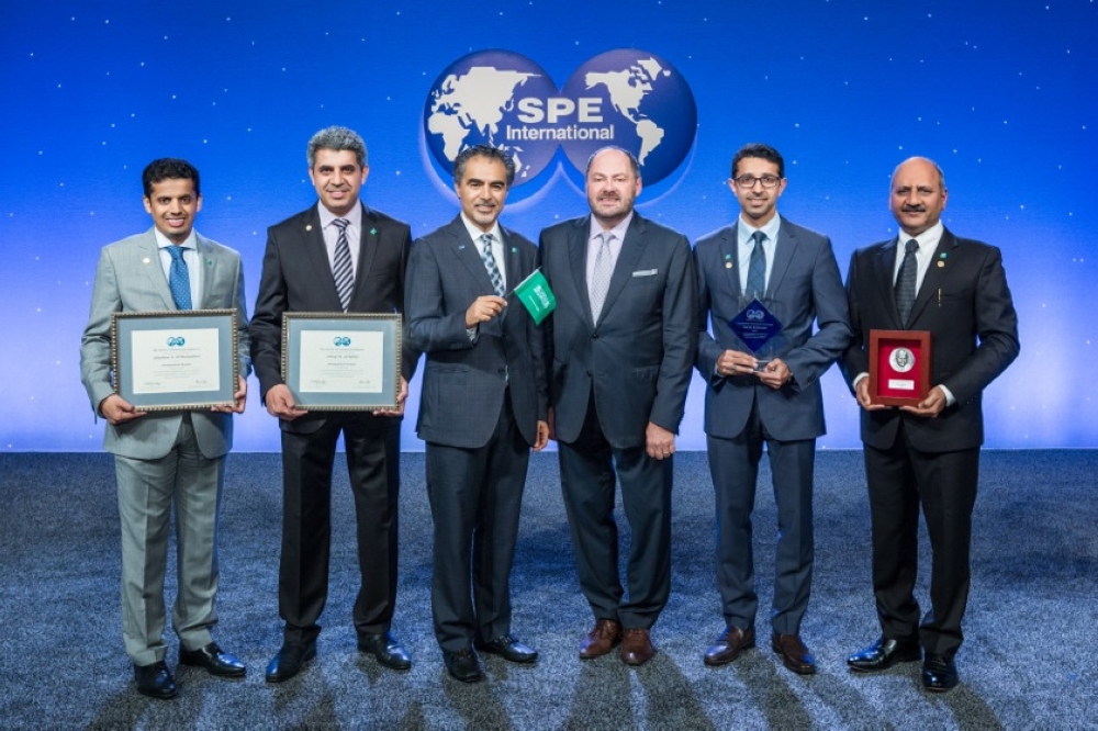 


Sami A. Al-Nuaim, manager of Aramco’s Petroleum Engineering Application Services department, along with other officials