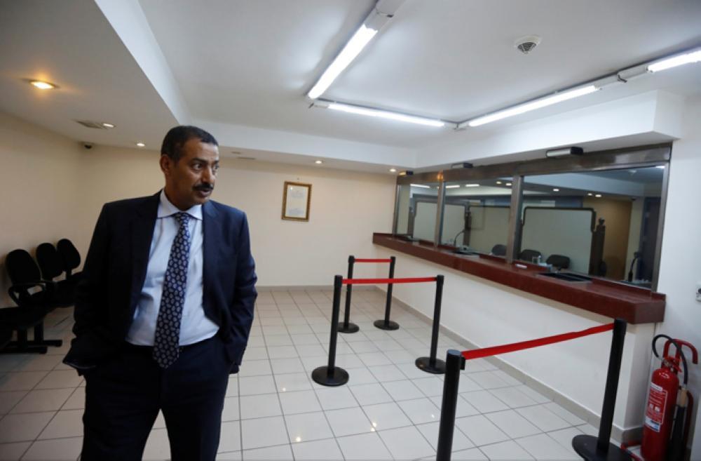 Consul General of Saudi Arabia Mohammad Al-Otaibi opens a cupboard as he gives a tour of Saudi Arabia’s consulate in Istanbul to journalists to prove that Jamal Khashoggi is not on the premises. — Reuters