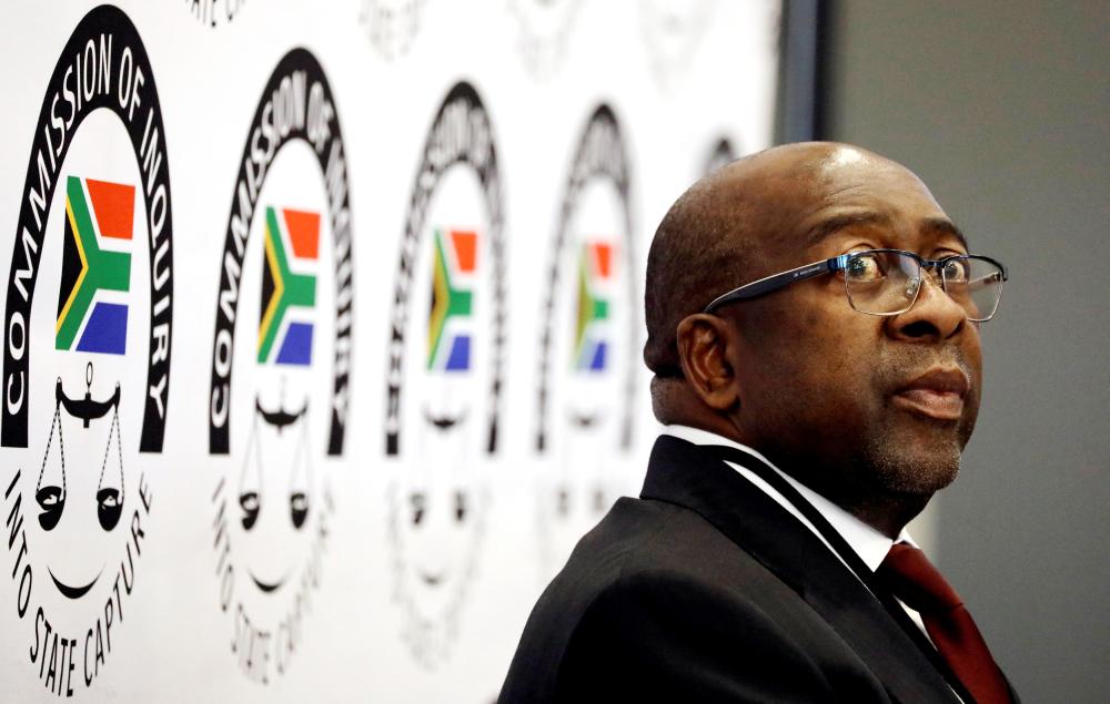 


South Africa’s Finance Minister Nhlanhla Nene looks on ahead of the Judicial Commission of Inquiry probing state capture in Johannesburg, South Africa, in this Oct. 3, 2018 file photo. — Reuters