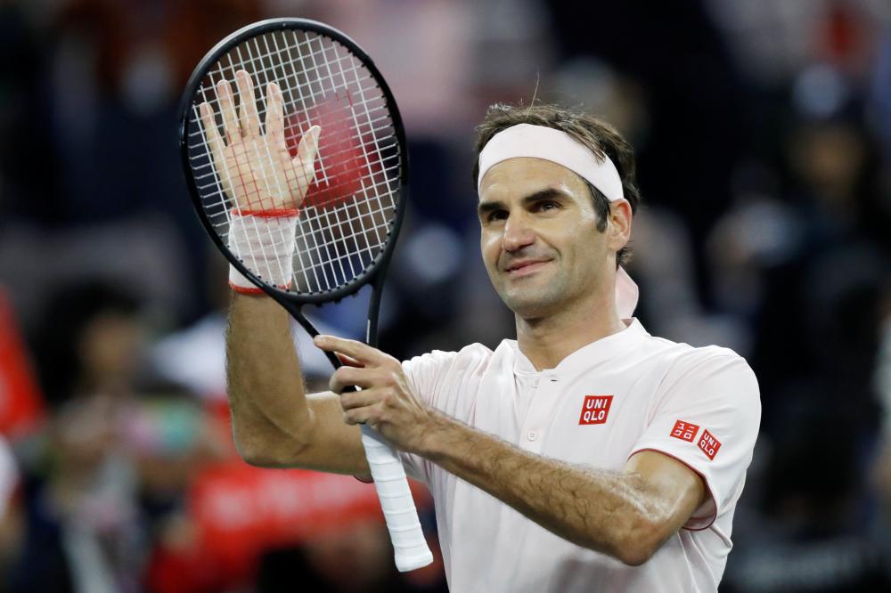 Roger Federer of Switzerland celebrates his victory against Daniil Medvedev of Russia at the Shanghai Open Wednesday. — Reuters