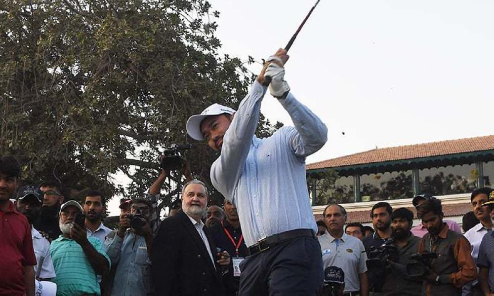 Cho Min Thant, COO of the Asian Tour Golf teed off the opening shot of the tournament at the Karachi Golf Club. — AFP