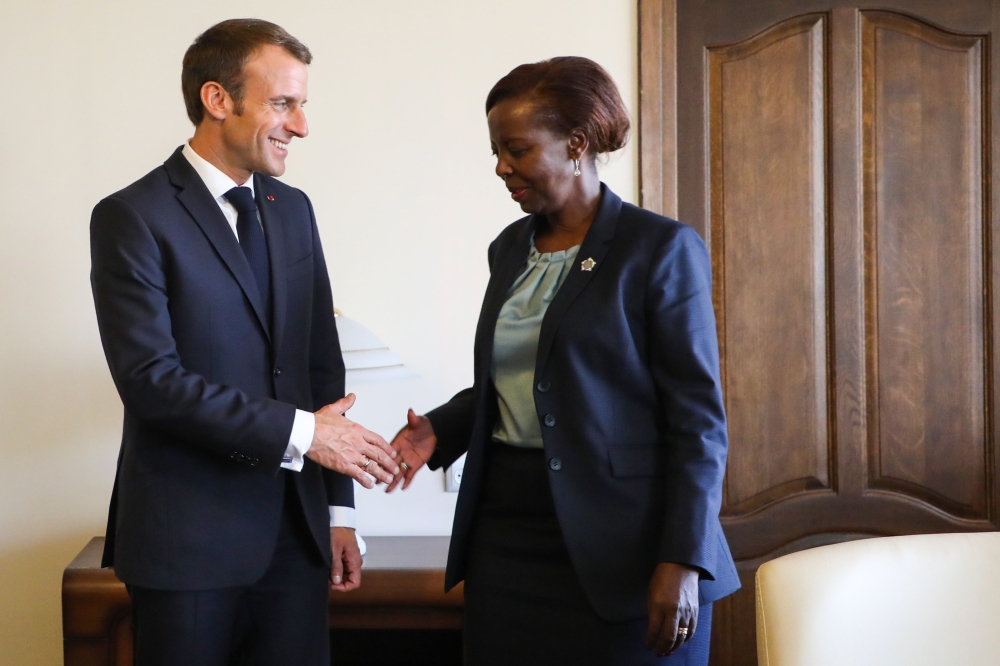 French President Emmanuel Macron meets with newly elected Secretary General of the International Organisation of French-speaking countries (OIF), Rwandan Foreign Minister Louise Mushikiwabo on the sidelines of the 17th Francophone countries summit in Yerevan on Friday. — AFP
