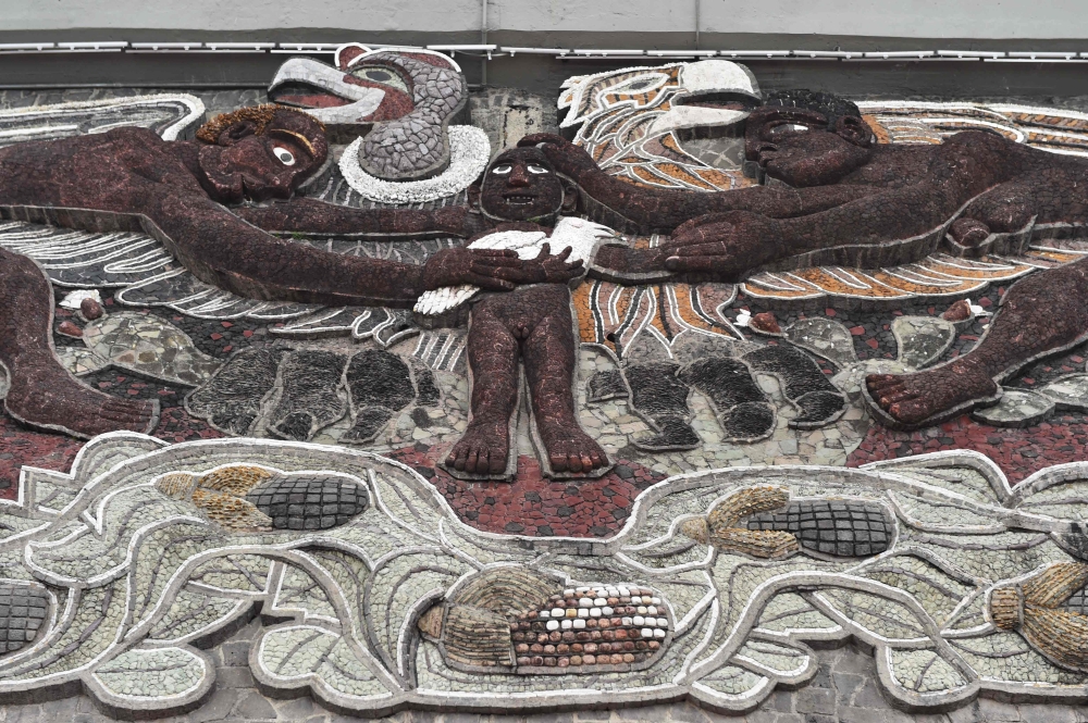 View of a detail of Mexican artist Diego Rivera's unfinished high relief work, at the main entrance of the Olimpico Universitario stadium, owned by the National Autonomous University of Mexico (UNAM), and which hosted the 1968 Summer Olympics, in Mexico City.— AFP