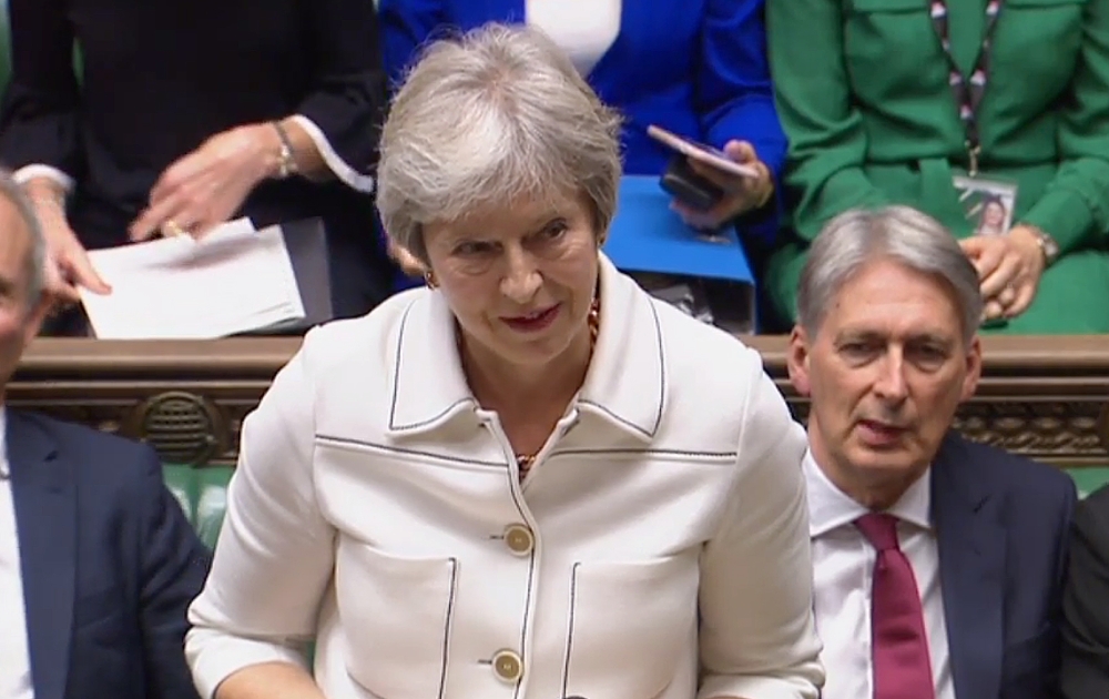 A video grab from footage broadcast by the UK Parliament's Parliamentary Recording Unit (PRU) shows British Prime Minister Theresa May speaking in the House of Commons on the latest progress on exit negotiation talks with the EU, in London on Monday. — AFP