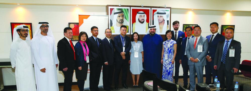 



Omar Khan and other GITEX officials pose with the Chinese delegation
