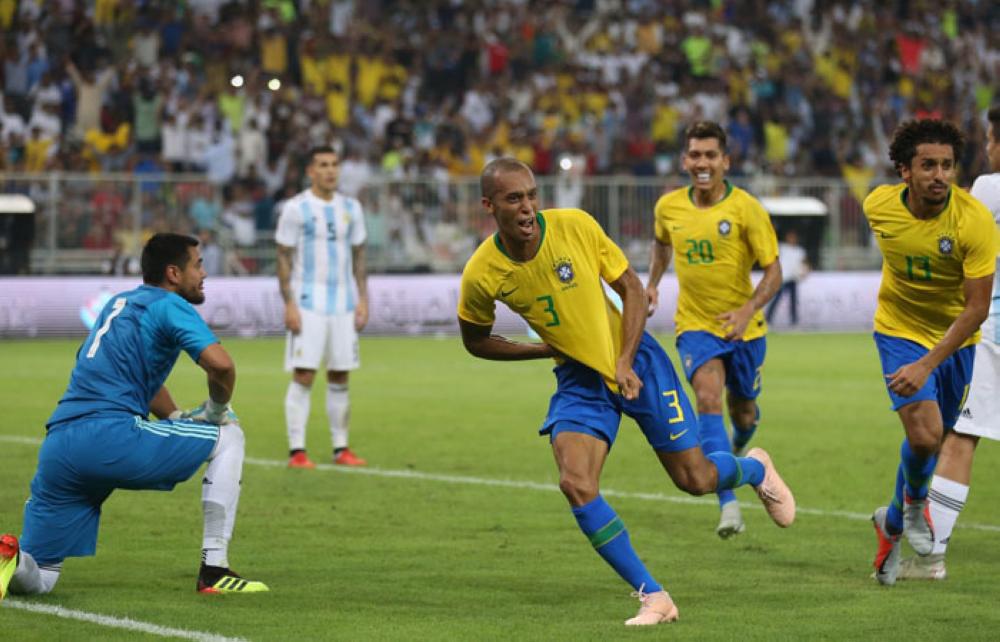 Brazilian players celebrate after winning the international friendly match against Argentina at the King Abdullah Sport City Stadium in Jeddah Tuesday. — AFP