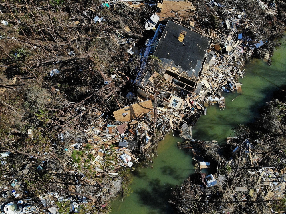 A destroyed house sits in debris and rubble in the aftermath of Hurricane Michael in Mexico Beach, Florida, on Wednesday. — AFP