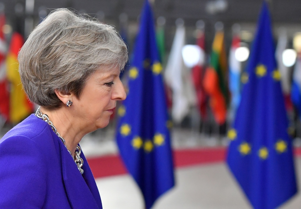 Britain’s Prime Minister Theresa May arrives at the European Council in Brussels on Thursday. — AFP
