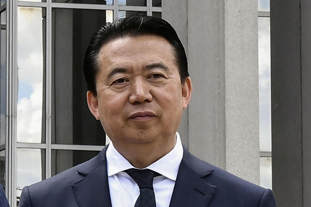 INTERPOL President Meng Hongwei poses during a visit to the headquarters of International Police Organisation in Lyon, France, May 8, 2018.    Jeff Pachoud/Pool via Reuters