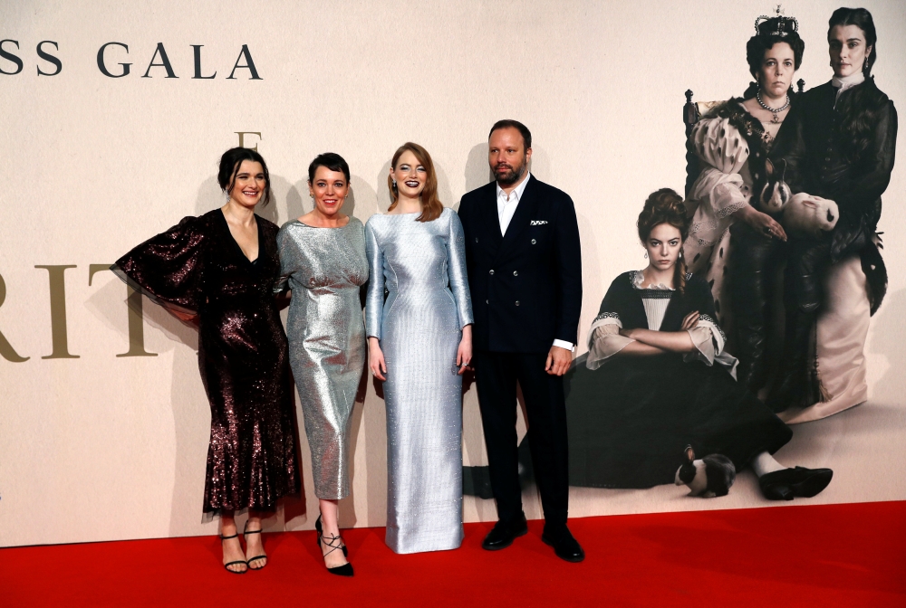 Director Yorgos Lanthimos with Rachel Weisz, Olivia Colman and Emma Stone pose at the UK Premiere of The Favourite during the London Film Festival in London on Thursday. — Reuters