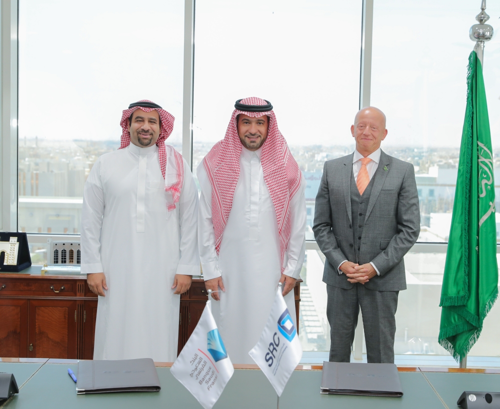 Majed Al-Hogail, Minister of Housing and Chairman of SRC, flanked by Fabrice Susini, Chief Executive Officer, SRC, and Rayan Fayez, Managing Director, BSF