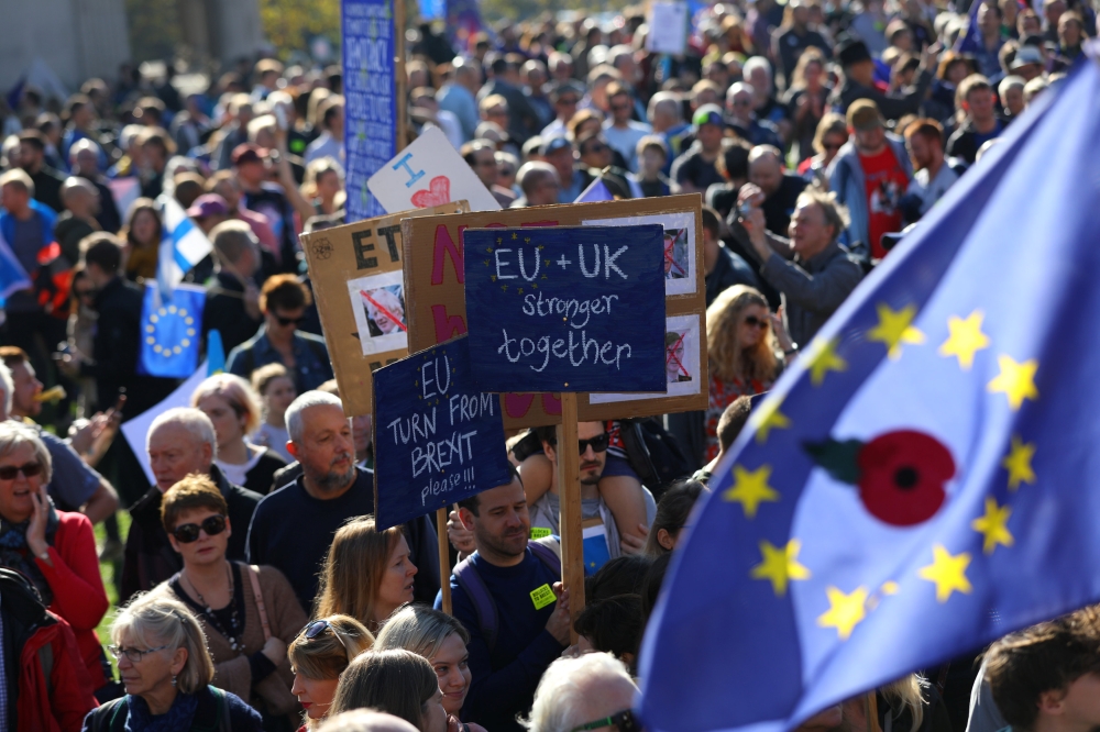 Protesters participating in an anti-Brexit demonstration, march through central London, Saturday. — Reuters