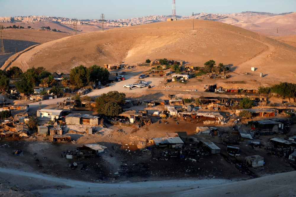


A general view shows the main part of the Palestinian Bedouin village of Khan Al-Ahmar in the occupied West Bank. — Reuters