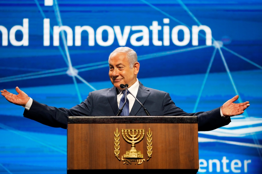 Israel’s Prime Minister Benjamin Netanyahu speaks at the Prime Minister’s Israeli Innovation Summit in Tel Aviv, Israel, on Thursday. — Reuters
