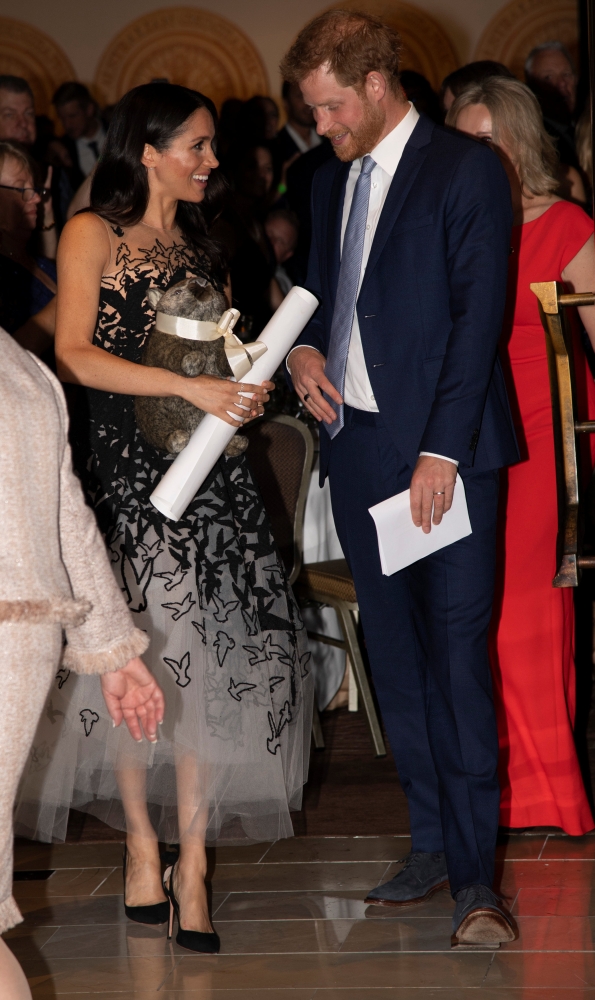 Britain’s Prince Harry and Meghan, Duchess of Sussex, attends The Australian Geographic Awards in Sydney, Australia, on Friday. — Reuters