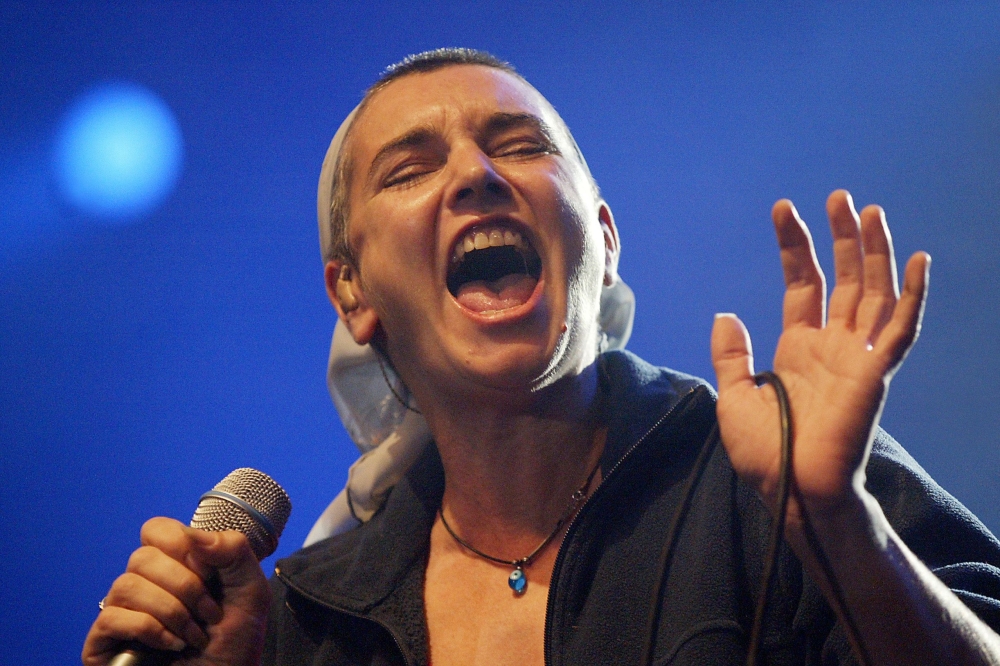 Irish pop singer Sinead O’Connor performs in Lorient, western France, during the 37th International Celtic Festival (FIL) in this Aug. 5, 2007 file photo. — AFP

.
AFP PHOTO  FRED TANNEAU Irish singer Sinead O'Connor has announced on October 26 ,2018 she has converted to Islam and changed her name to Shuhada. Having adopted the name Magda Davitt last year, the 51-year-old is now called Shuhada Davitt. She also changed her Twitter avatar to a black-and-white image of the Nike Swoosh logo and the slogan: 