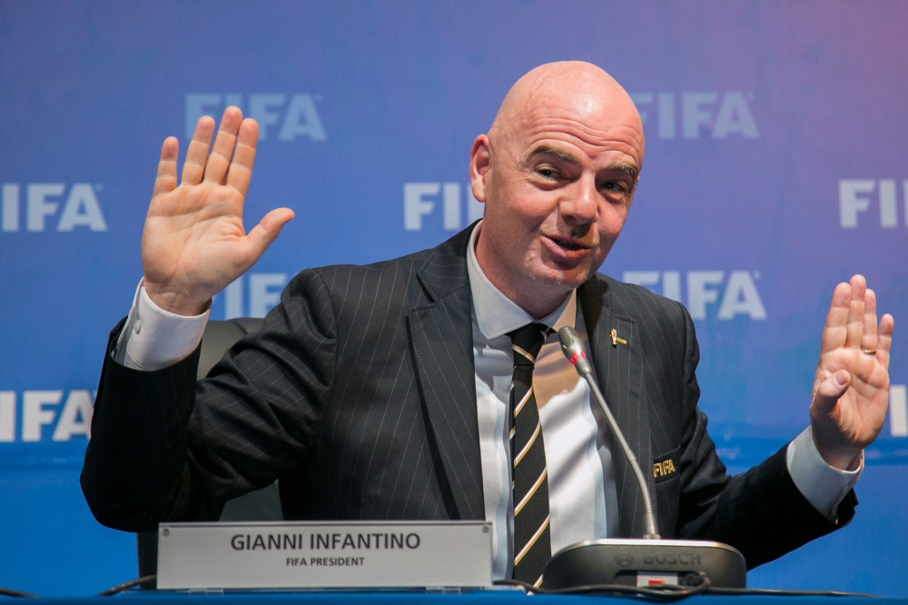 President of the International Federation of Association Football (FIFA) Gianni Infantino speaks during a press conference on Friday, after a FIFA Council meeting at the Convention Center in Kigali. — AFP