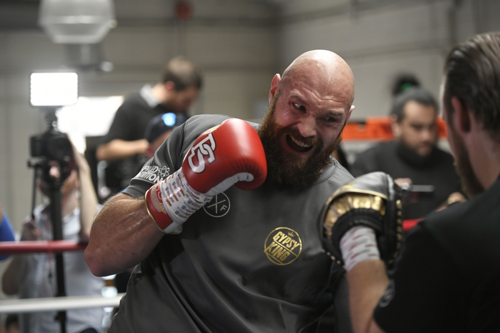 Lineal Heavyweight Champion Tyson Fury works out in front of Los Angeles media in advance of his highly anticipated WBC Heavyweight World Championship against undefeated WBC World Champion Deontay Wilder on Dec. 1, at Churchill Boxing Club on Thursday in Los Angeles, California. — AFP