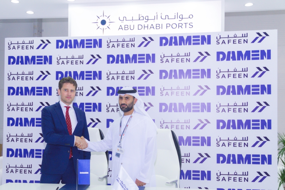 Captain Adil Ahmed Banihammad, Acting Chief Marine Services Officer at Safeen, and Pascal Slingerland, Regional Sales Director for Damen Shipyards Group, shake hands after signing the agreement

