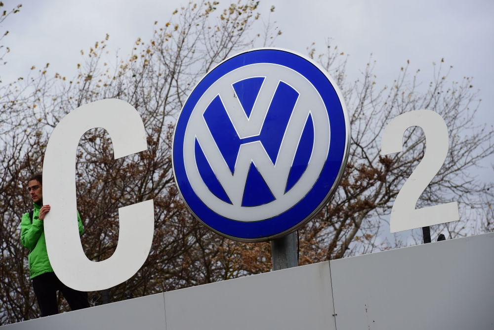 In this file photo Greenpeace activists demonstrate at the entrance to the Volkswagen (VW) plant in Wolfsburg, central Germany. Volkswagen will on Thursday get a taste of the anger felt by duped diesel drivers on its home turf when consumer groups file Germany's first class-action suit over the carmaker's emissions cheating scam. — AFP