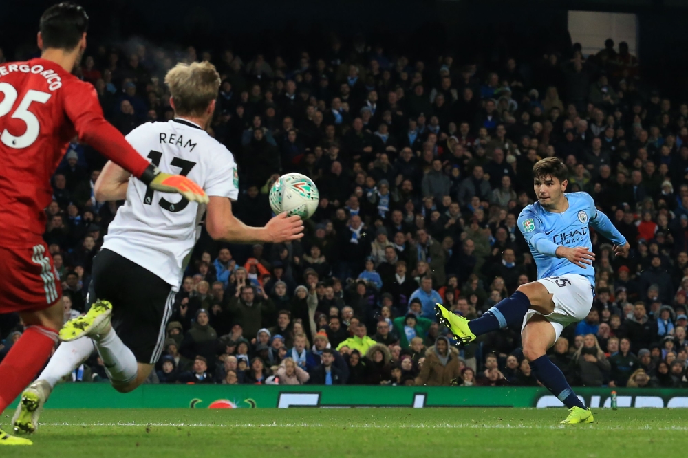 Manchester City's Spanish-born midfielder Brahim Diaz (R) shoots to score their second goal during the English League Cup, 4th round football match against Fulham at the Etihad Stadium in Manchester, north west England, on Thursday. — AFP