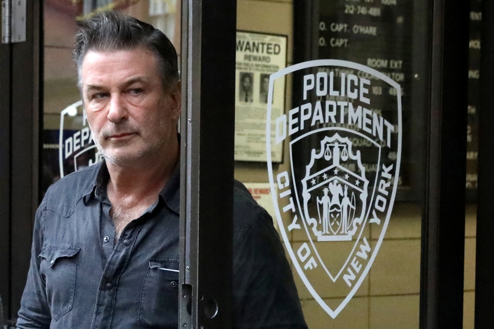 


Actor Alec Baldwin exits the 6th precinct of the New York Police Department in Manhattan, New York. — Reuters