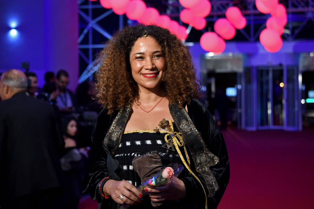 


Tunisian singer, songwriter, writer and graphic designer, Ghalia Benali, arrives at the opening ceremony of the 29th edition of Carthage Film Festival (JCC) in Tunis. — AFP