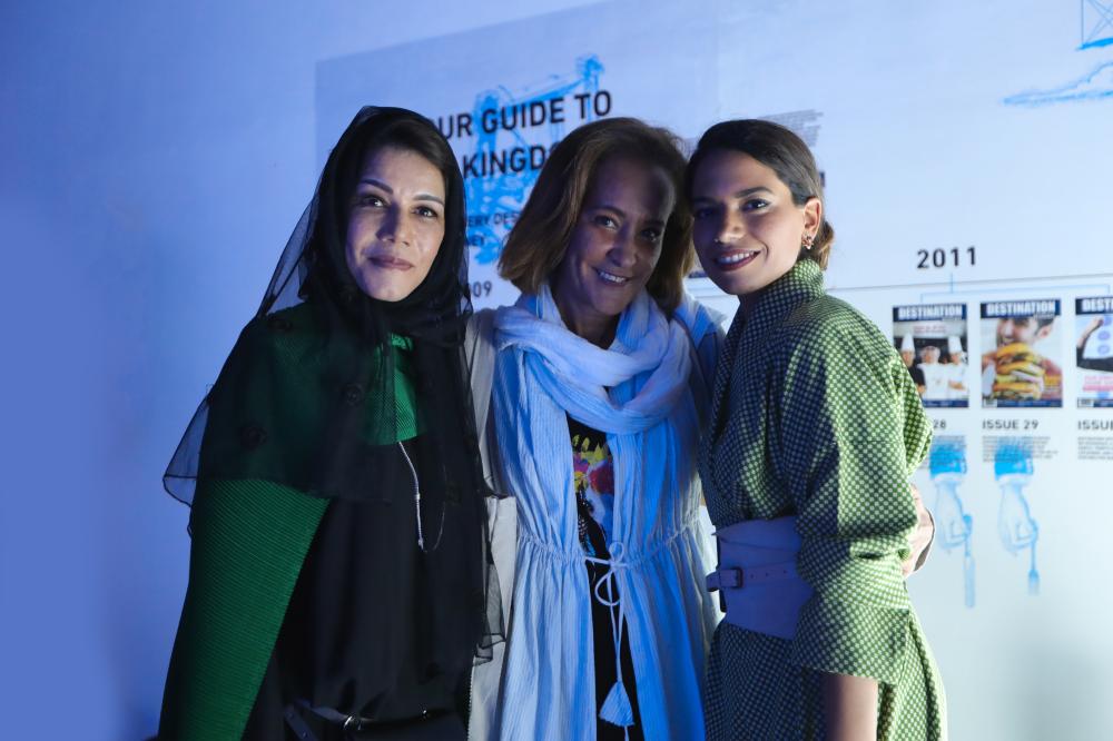 


Enas Hashani and Maria Mahdaly with a guest.