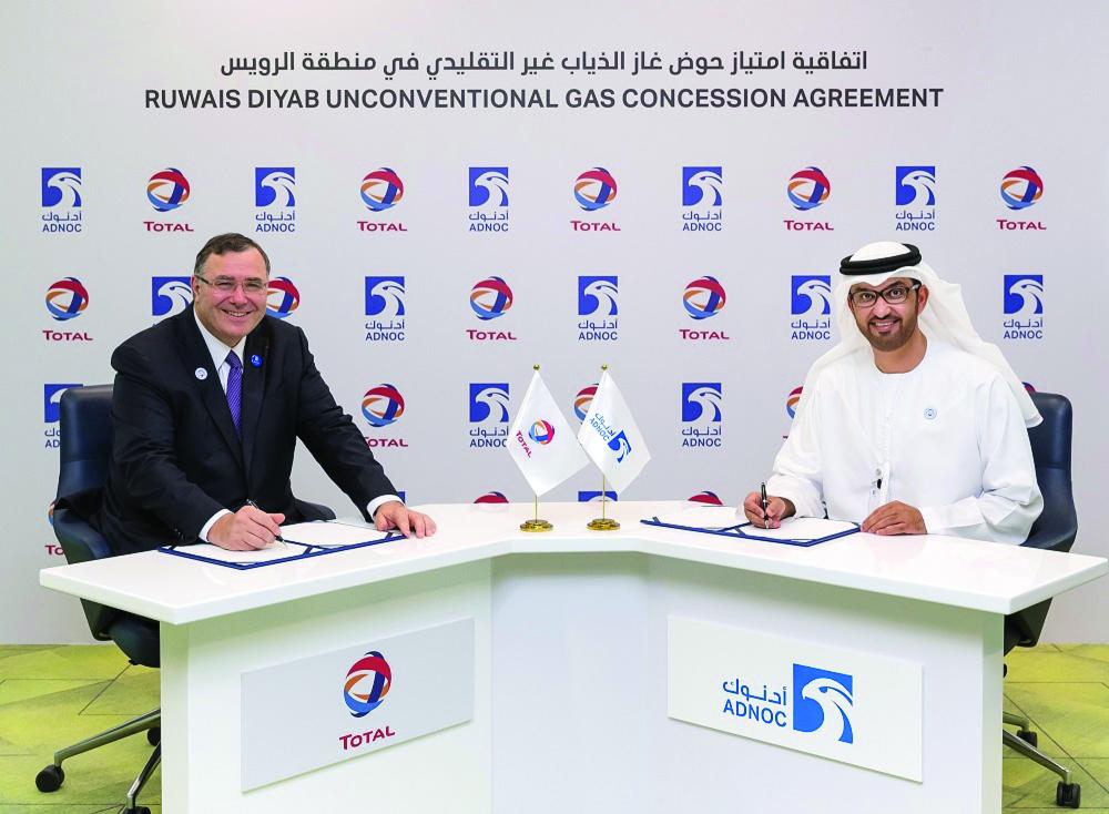 


 Adnoc-Total concession signing