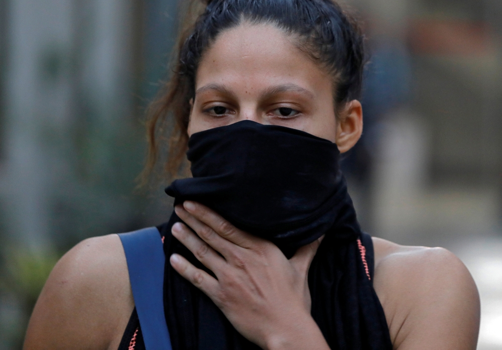 


Colombian boxer Dayana Cordero covers her face with a cloth after her practice session ahead of AIBA Women's World Boxing Championships at Indira Gandhi Indoor Stadium in New Delhi, India, on Monday. — Reuters