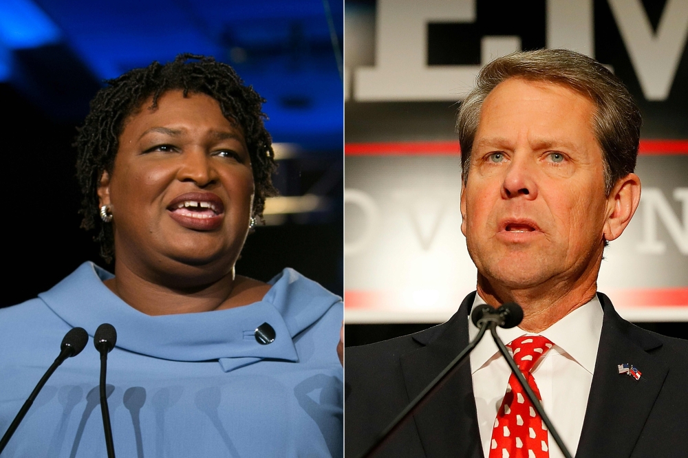 This combination of file pictures created on Nov. 07, 2018 shows Democratic gubernatorial candidate Stacey Abrams, left, and Republican candidate Brian Kemp. — AFP