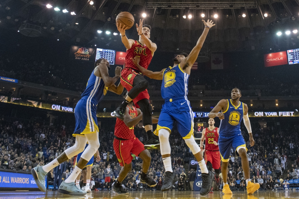 


Atlanta Hawks guard Jeremy Lin (7) shoots the basketball against Golden State Warriors guard Quinn Cook (4) during the fourth quarter at Oracle Arena. — Reuters