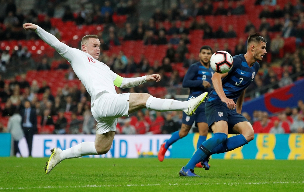 England's Wayne Rooney misses a chance to score during the International Friendly match against United States at the Wembley Stadium, London, Britain, on Thursday. — Reuters 