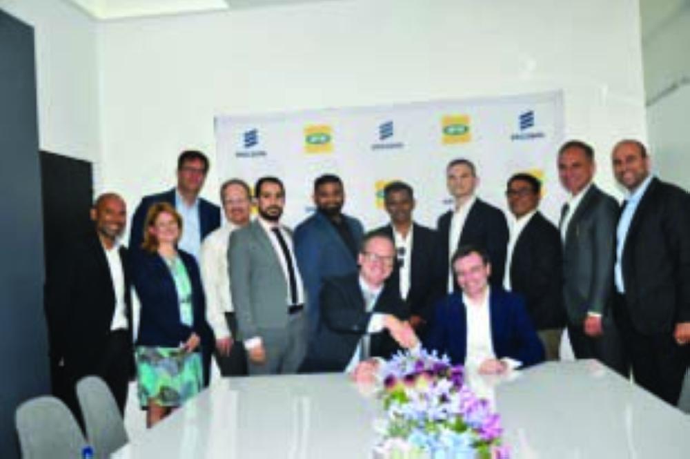 



Officials of the signatory companies pose for a group photo