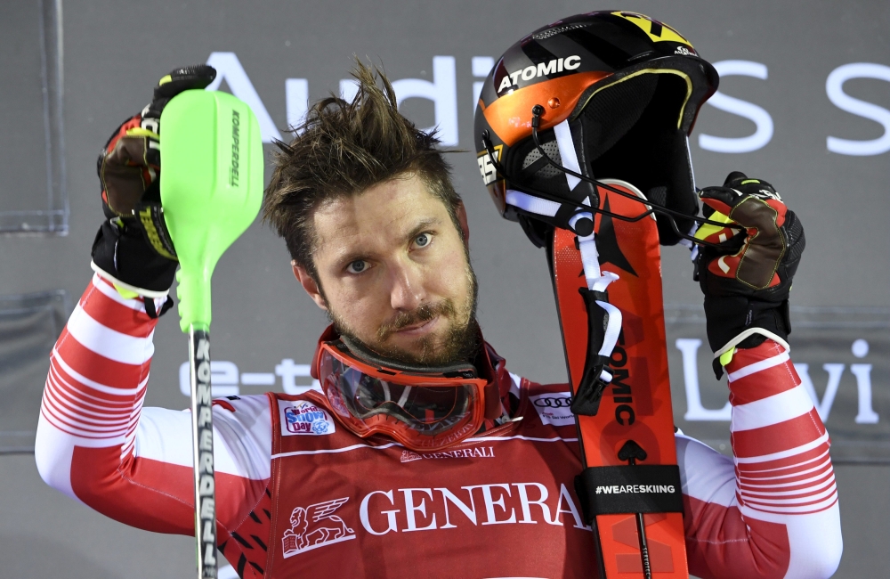 Winner Marcel Hirscher of Austria celebrates on the podium after the second run during the FIS Alpine Ski World Cup  Mens' Slalom at the Levi, Kittila, Finland, on Sunday. — Reuters