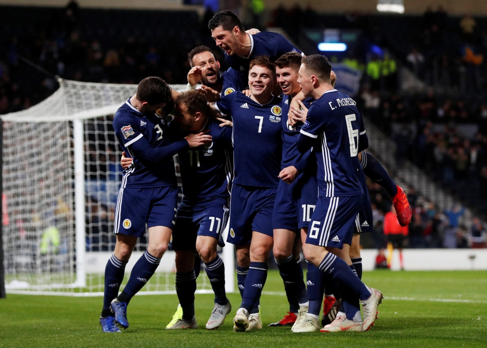 Scotland's James Forrest celebrates scoring their third goal to complete his hat-trick against Israel during the UEFA Nations League - League C - Group 1match at Hampden Park, Glasgow, Britain, on Tuesday. — Reuters