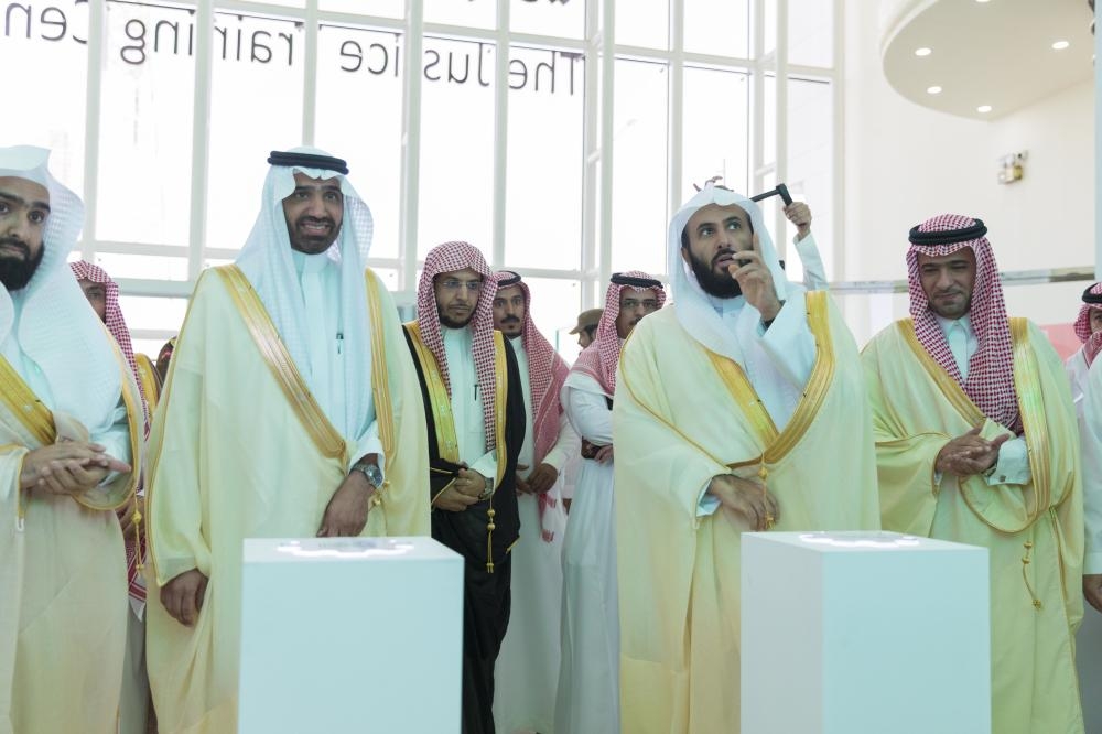 


Justice Minister Waleed Al-Samaani (2nd right) and Ministry of Labor and Social Development Ahmad Al-Rajhi (2nd left) at the launch of labor courts during a special event at the Justice training center in Riyadh on Sunday. — SPA