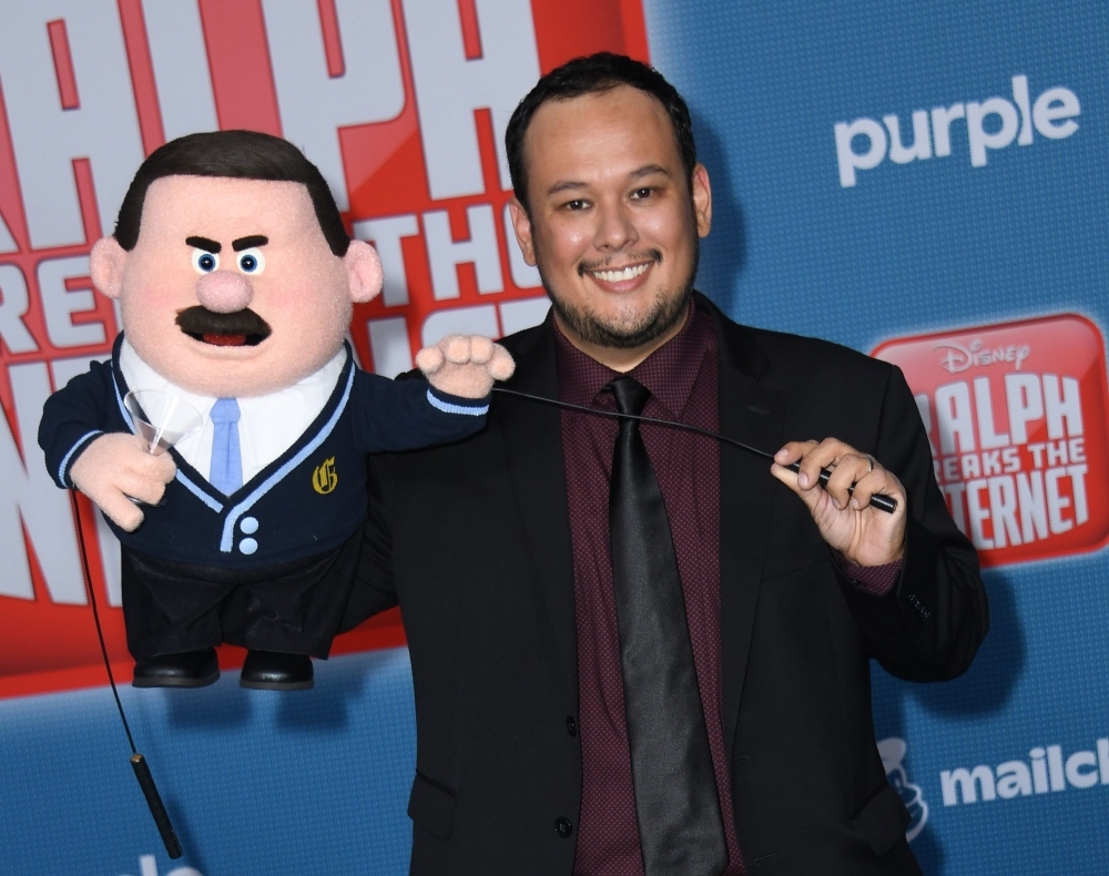 In this file photo taken on Nov. 5, 2018 animator Raymond S. Persi arrives for the Disney premiere of 