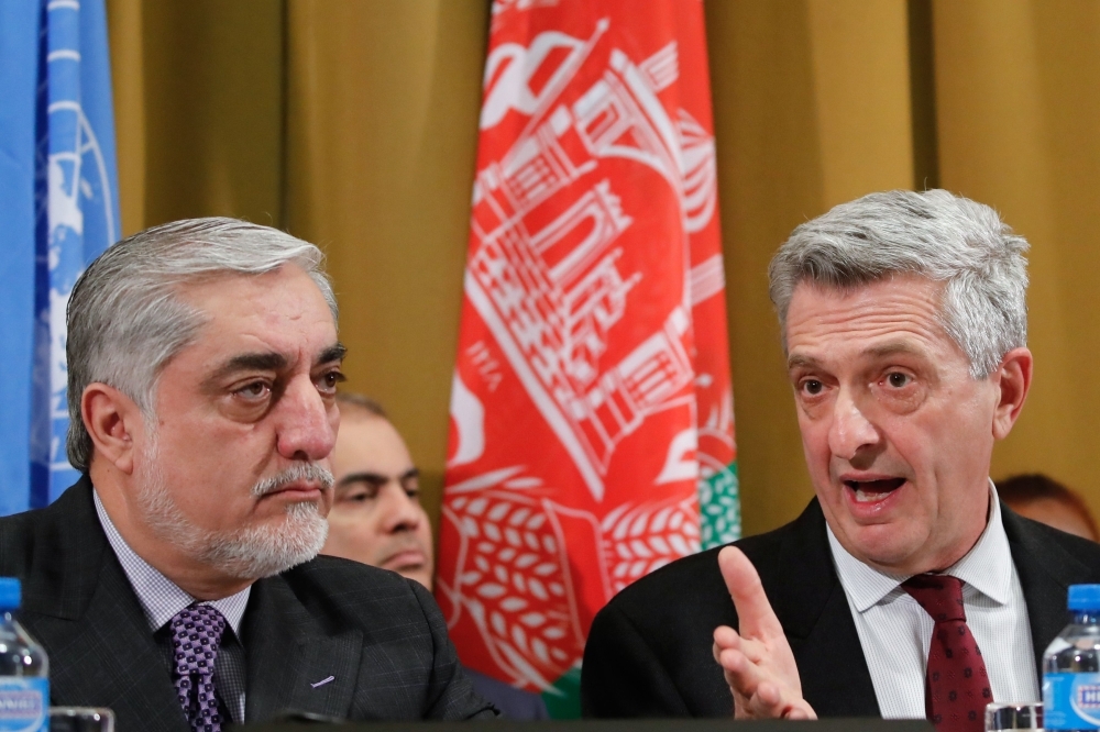 Afghanistan’s Chief Executive Abdullah Abdullah, left, and United Nations High Commissioner for Refugees Filippo Grandi attend a UN debate on Afghanistan’s performance in the private sector at the Geneva Conference on Afghanistan in Geneva on Tuesday. — AFP