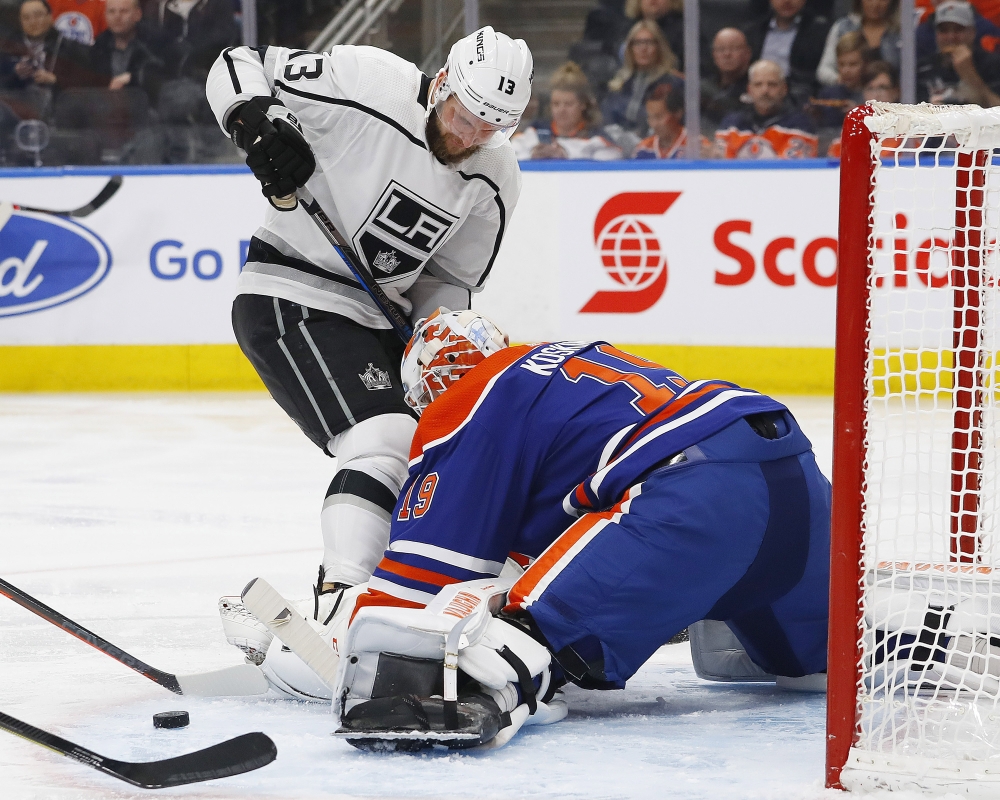 Edmonton Oilers goaltender Mikko Koskinen (19) makes a save on Los Angeles Kings forward Kyle Clifford (13) during the second period at Rogers Place. — Reuters