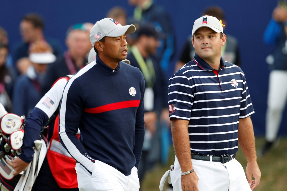 Team USA's Tiger Woods and Patrick Reed during the Fourballs event of the 2018 Ryder Cup at Le Golf National in Guyancourt, France, in this file photo. — Reuters