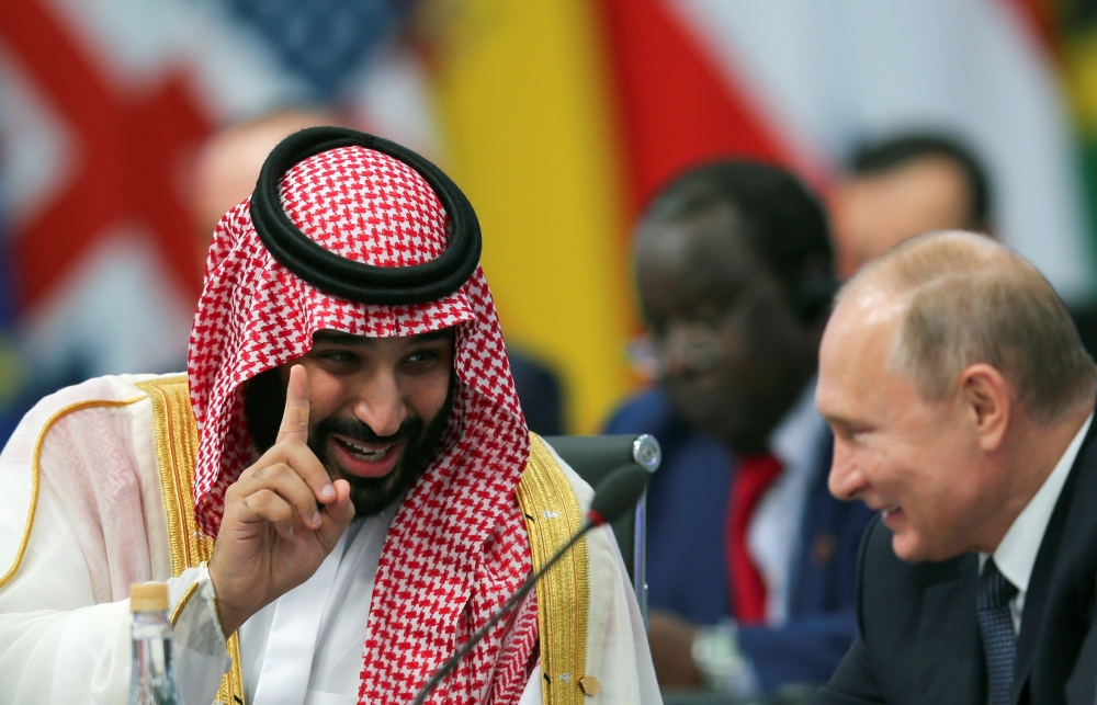 Crown Prince Muhammad Bin Salman speaks with Russia's President Vladimir Putin during the opening of the G20 leaders summit in Buenos Aires, Argentina, on Friday. — Reuters