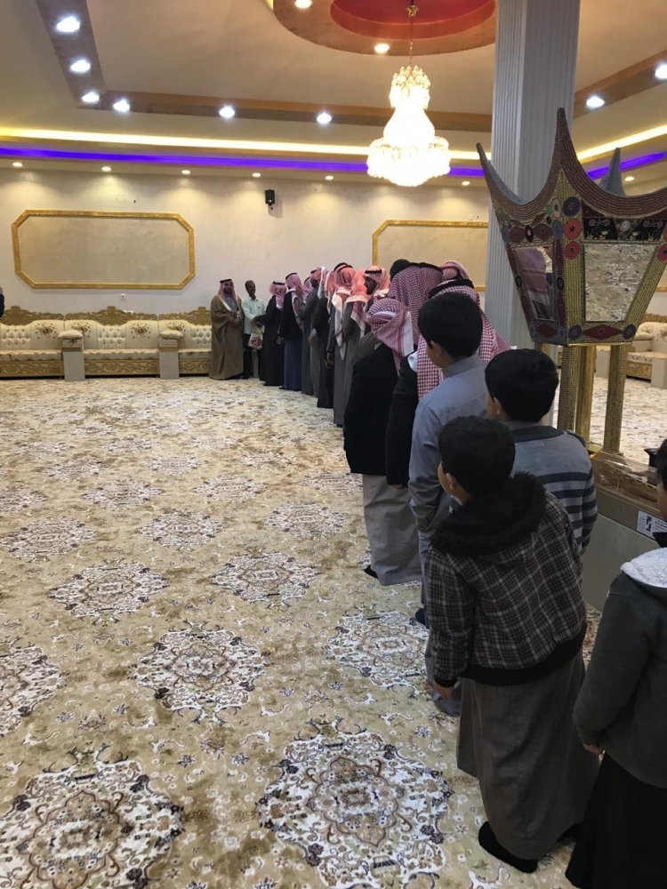 


Members of the Al-Shemri family, young and old alike, line up to bid farewell to Mido Sheerian, their loyal employee for 35 years.