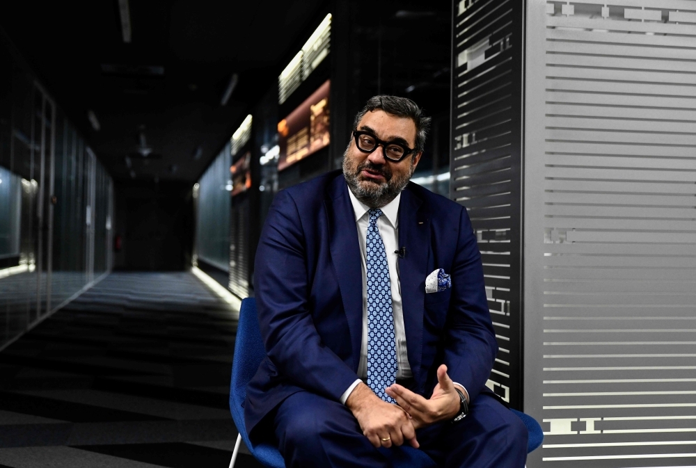 Yiannis Exarchos, CEO of the Olympic Broadcasting Services (OBS) and Executive Director of the Olympic Channel gives an interview at the Olympic Channel headquarters in Madrid. In a building overlooking a highway in Madrid, more than 160 people of 35 nationalities have the mammoth task of organizing television production of the world's most watched sporting event, the Olympic Games. — AFP