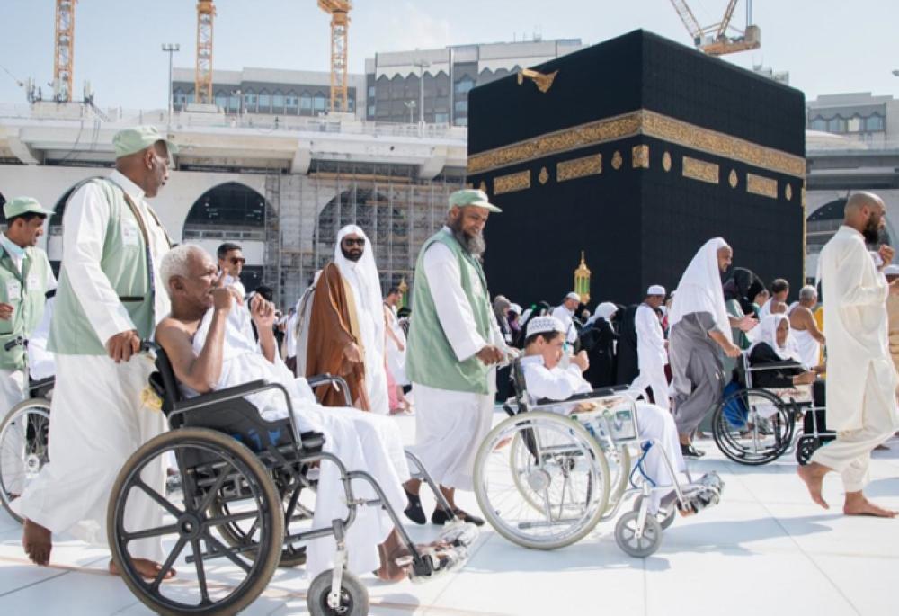  People with special needs performing tawaf on wheelchairs around the Kaaba on Monday as the circumambulation area was reserved for two hours for them to observe the International Day of Persons with Disabilities. — SPA