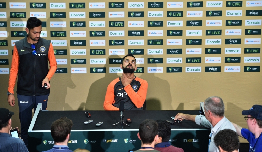 India cricket captain Virat Kohli (C) attends a press conference ahead of the first Test at the Adelaide Oval in Adelaide on Wednesday. — AFP